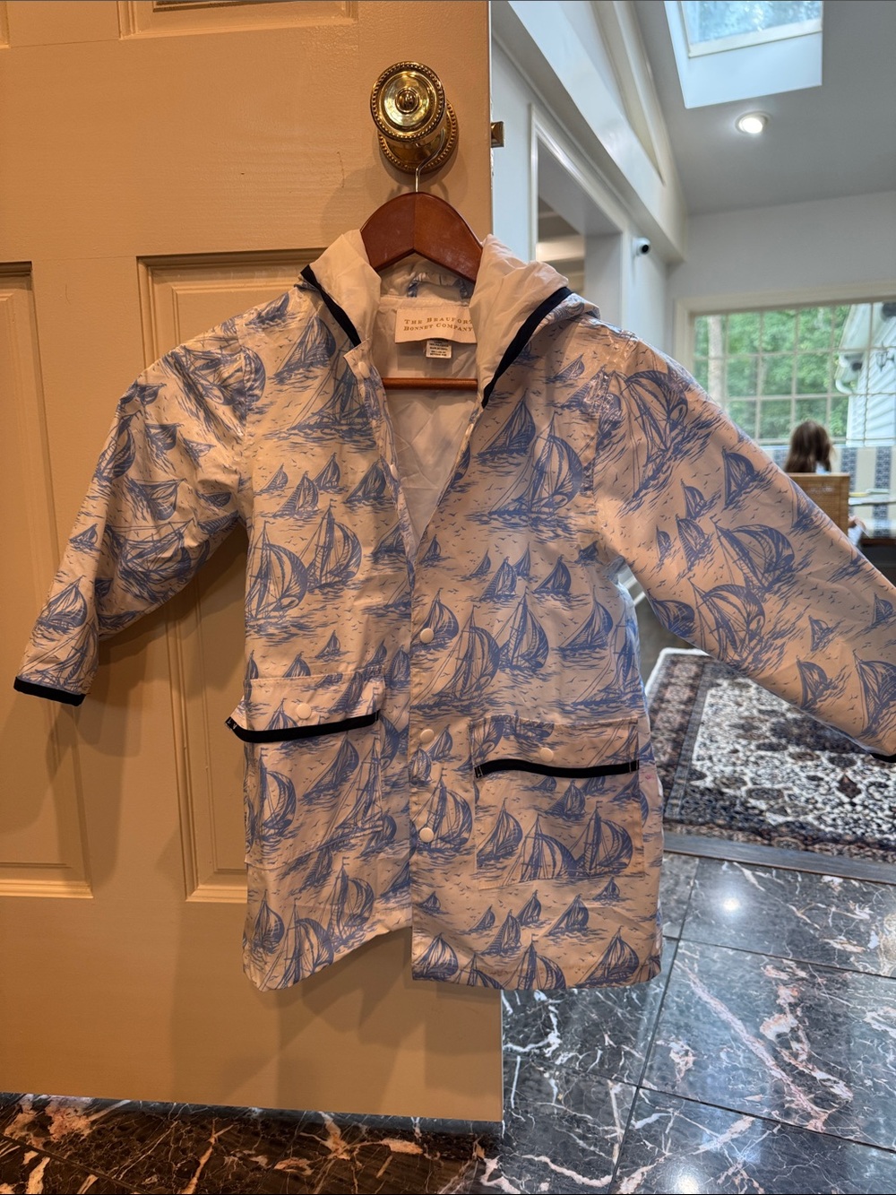 The Beaufort Bonnet Company White Raincoat with Blue Sailboat Print